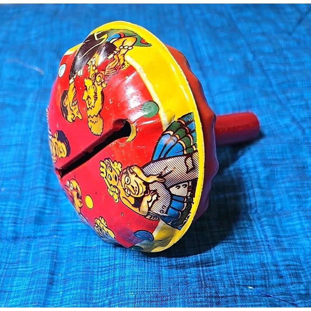 Tin Noisemaker Toy Comic Lovers Bell Wood Handle Vintage